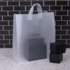 Prime Line Packaging Plastic Gift Bags with Handles, Clear T...